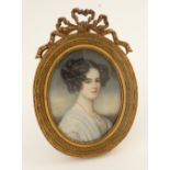 λContinental School Mid 19th Century Portrait miniature of a noblewoman, wearing a white dress and