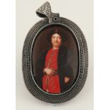 Continental School 20th Century Portrait miniature of a gentleman, in oriental dress Oval, enamel