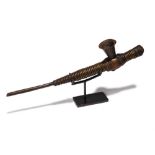 A Kota pipe Gabon with brass, copper and iron wire, the iron bowl with carved linear decoration,