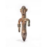 A Djenne style female three quarter figure bronze, with swollen abdomen and rings to one arm and the