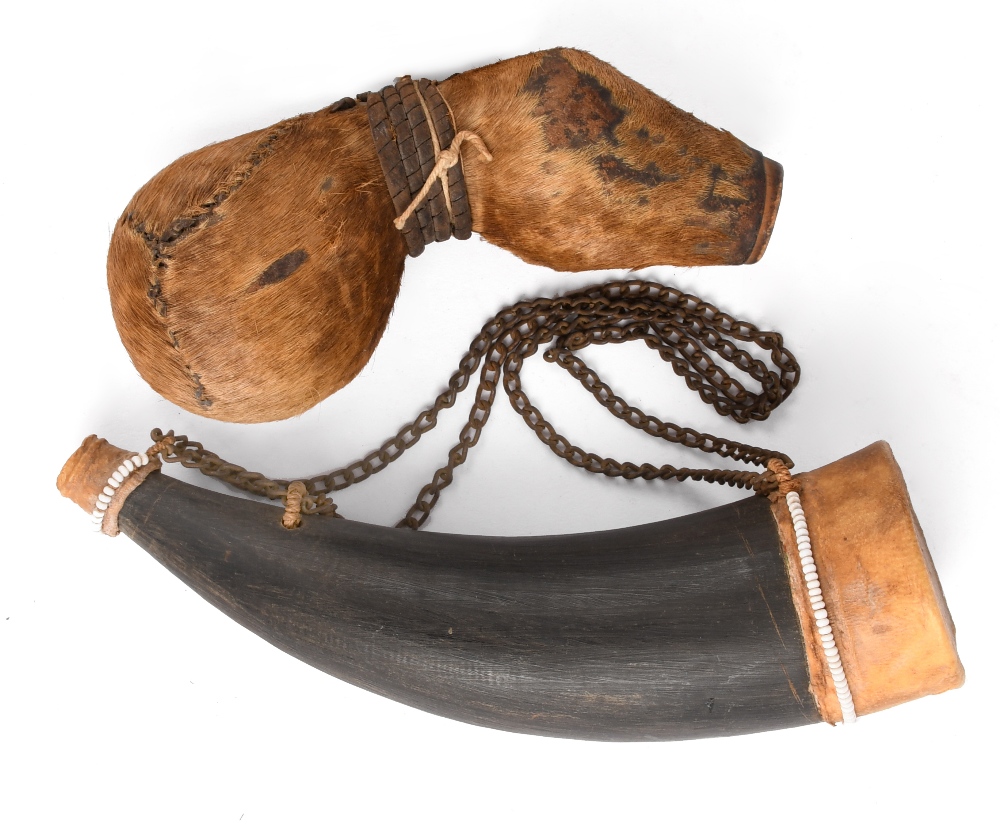 A Maasai snuff container Kenya gourd with stitched animal hide and leather binding, with a