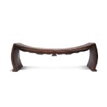 A Tonga headrest kali hahapo Polynesia the underside with a carved wavy medial ridge, 15cm high,