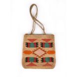 A Nez Perce corn husk bag Plateau with differing dyed geometric designs to either side, with