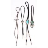 Four Navajo bolo ties South East North America leather, turquoise and silver coloured metal, the