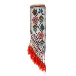 An Obijwa knife sheath Northeast North America red blanket cloth, cotton, wool, a rawhide toe and an
