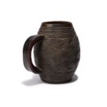 A Kuba palm wine cup Democratic Republic of the Congo with a wide carved geometric band with