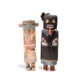 A Hopi kachina doll Southwest North America with pigment decoration and fibre, 19cm high, and a He'
