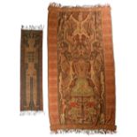 A Sumba ikat hinggi cloth Indonesia depicting mythical winged beasts, dragons, crocodiles, horses
