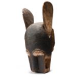 A Baule zoomorphic helmet mask bonu amwin Ivory Coast modelled with a large pair of ears and an open