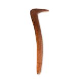 An Aboriginal swan neck boomerang Australia one side with carved channeled linear decoration, 66cm