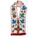 An Ojibwa bandolier Northeast North America canvas cloth, coloured glass beads of trailing floral