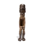 A Teke power figure Democratic Republic of the Congo with facial scarifications and a short flared