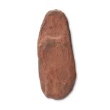 An Aboriginal churinga Australia stone with carved linked concentric circles and parallel linear