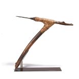 A Middle Sepik adze Papua New Guinea wood, steel and rattan, the handle with a floret carved