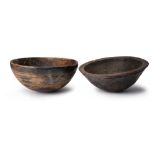 Two Tuareg bowls North Africa one with linear carved decoration to the outside and the other to