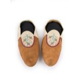 A pair of Athapaskan moccasins Subarctic smoked buckskin, caribou, coloured cotton thread, dyed