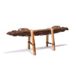 A Murik Lakes headrest Sepik River, Papua New Guinea the top with ancestor head ends and with a