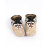 A pair of Cree or Saulteaux moccasins Subarctic unsmoked buckskin with sack cloth vamps and cuffs