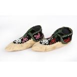 A pair of Cree or Ojibwa moccasins Eastern Subarctic buckskin, velveteen, military braid and