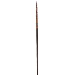 A Bougainville Island spear Solomon Islands, Melanesia palmwood, fibre and bone, with a barbed