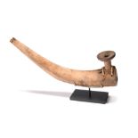 An Inuit pipe Siberia maple, the bowl attached with bird quill, the underside with a removable