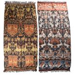 Two Sumba ikat hinggi cloths Indonesia one with shields, horsemen, head racks, animals and birds,