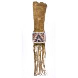 An Ojibwa or Cree pipe bag Plains buckskin with remains of yellow pigment, cloth, coloured glass and