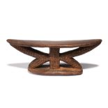 A Papua New Guinea headrest Boiken / Arapesh area with a central and two angled supports with carved