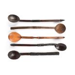 Five Zulu spoons South Africa with differing carved decoration to the handles, three with pointed