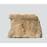 A Greek marble statue base fragment the stepped frieze with carved key and flowerhead panels above