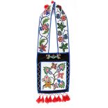 An Ojibwa bandolier bag Northeast North America velveteen, cloth and coloured glass beads, with