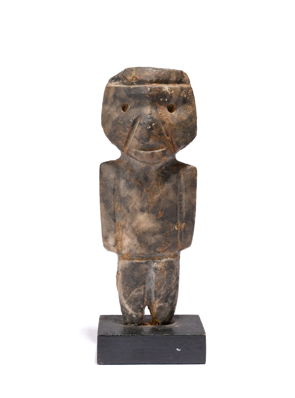 A Mezcala standing figure Guerrero, Mexico diorite, circa 300BC - 100AD, 17.2cm, mounted in a wood
