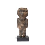 A Mezcala standing figure Guerrero, Mexico diorite, circa 300BC - 100AD, 17.2cm, mounted in a wood