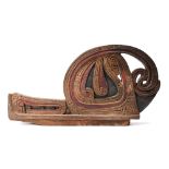 A Massim canoe prow tabuya Trobriand Island, Papua New Guinea with carved curvilinear bird head