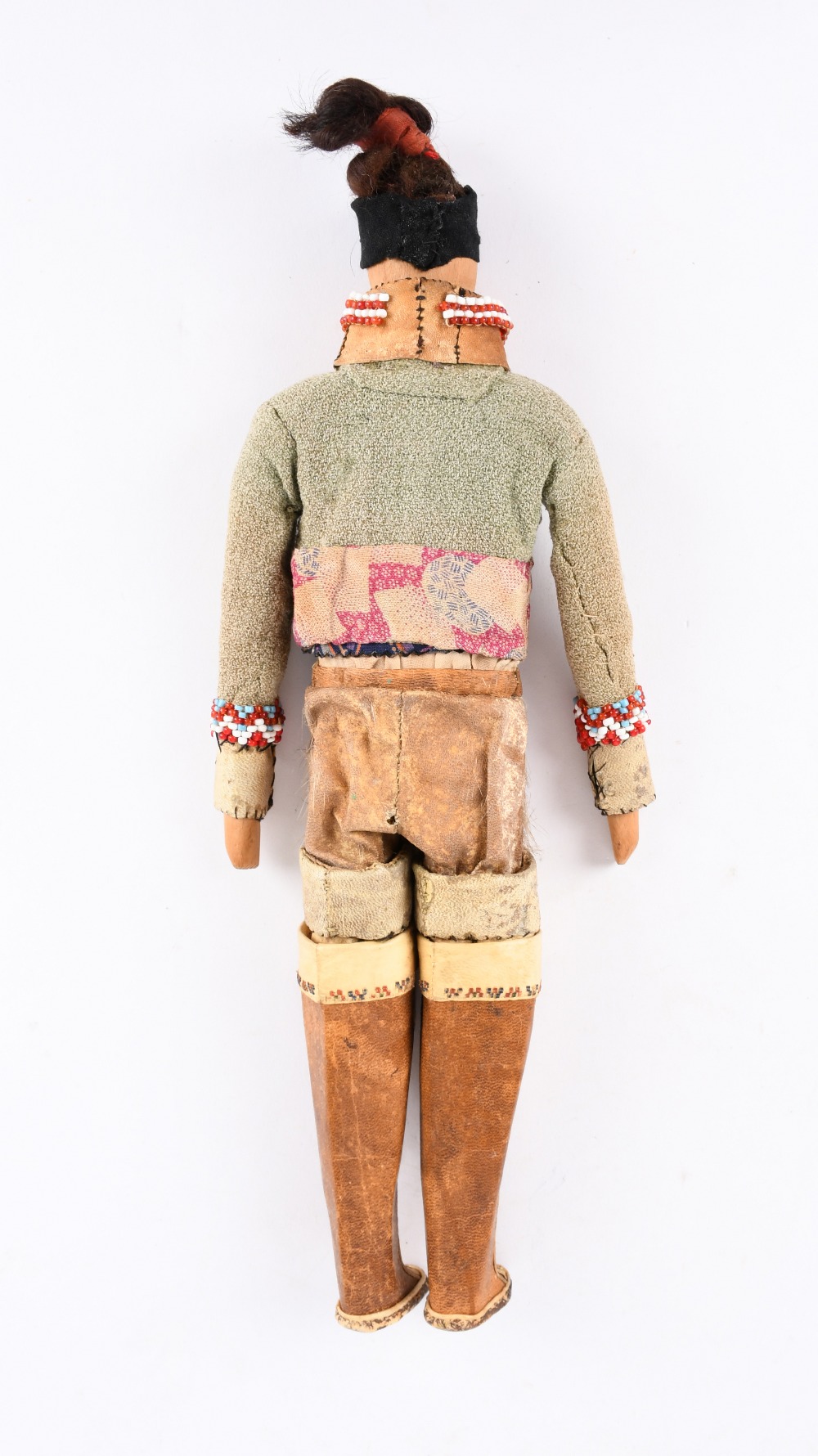 An Inuit doll Greenland wood, sealskin, cloth, hair and beads, in traditional dress, circa 1900, - Image 2 of 2