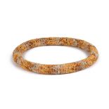 A Tahiti crown French Polynesia oval fibre ring with tightly woven small shells, 25cm x 20cm.