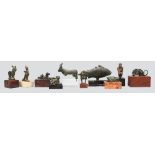 A collection of bronze animal amulets and models Egyptian, Roman and later including an Apis Bull,