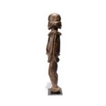 A Lobi Janus standing figure Burkina Faso male and female with a cap coiffure, 48.5cm high.