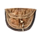 λAn Inuit woman's sewing bag Alaska seal and walrus skin, with applique geometric borders, the