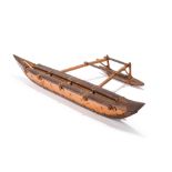 A Kiribati Islands model outrigger Micronesia/Melanesia wood with fibre binding, with an paddle,