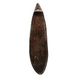 A Vanuatu food platter Melanesia with a carved scalloped edge, one end pointed and pierced for