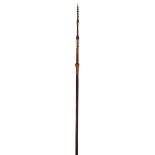 A Bougainville Island spear Solomon Islands, Melanesia palmwood, bone and fibre, with barbed tip and