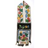 An Ojibwa bandolier bag Northeast North America velveteen, cloth, waxed cotton, wool and coloured