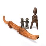 A Baule figural catapult Ivory Coast 19cm high, a cast bronze male and female group, 9.8cm high