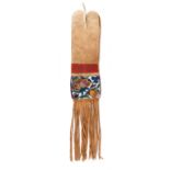 An Ojibwa or Cree pipe bag Northern Plains moosehide, cloth and coloured glass beads, with beaded