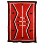 A Navajo Germantown rug Southwest North America the tri-colours with arrow and zig-zag designs,