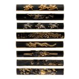 A small collection of Japanese kogatana handles (kozuka), each gilt on the back and edges, the faces