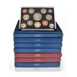 A collection of Royal Mint proof set coins, including; Elizabeth II, 2000, 'Millennium' £5 struck in