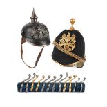 A Royal Artillery officer's blue cloth Home Service helmet, gilt brass front plate and ball spike on