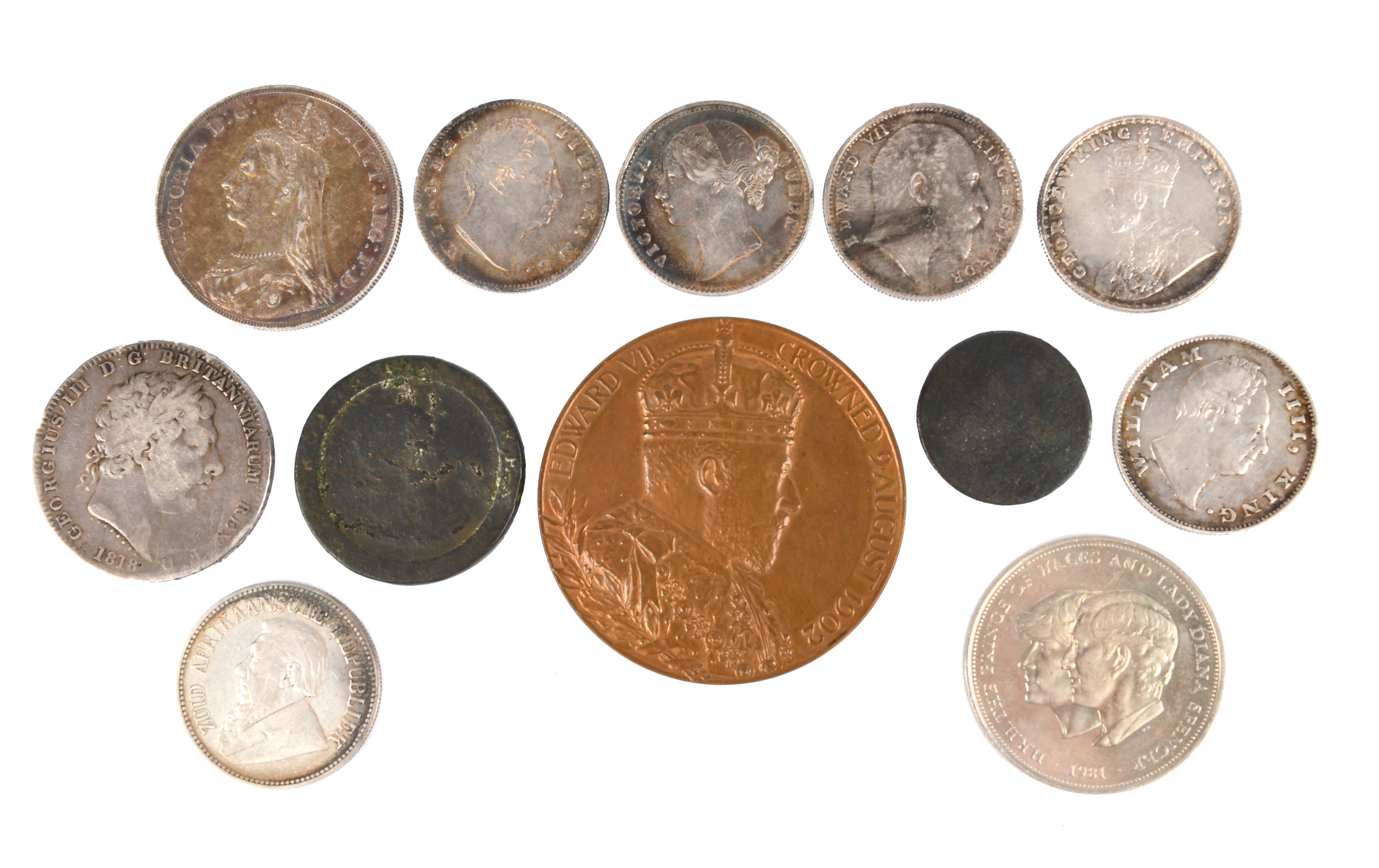 A small collection of coins and other numismia, comprising: Britain: George III, silver crown, 1818,